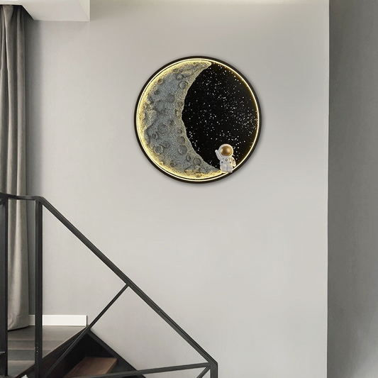 Kids room lighting guide featuring a glowing moon wall art with an astronaut for a fun decor.