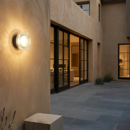 Embrace Modern Outdoor Wall Lamp - Clear Glass & Metal Round Design for Patio